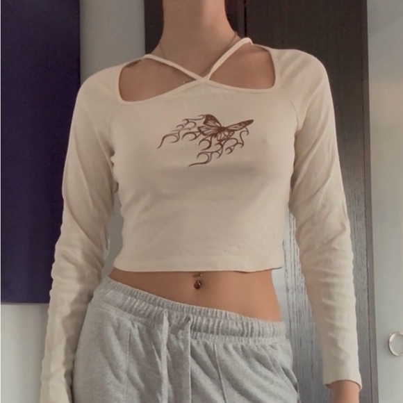Urban Outfitters Tops - Urban Outfitters Cream Long Sleeve Top with Graphic